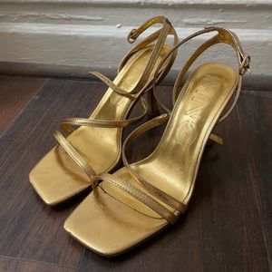 Gold strappy heels